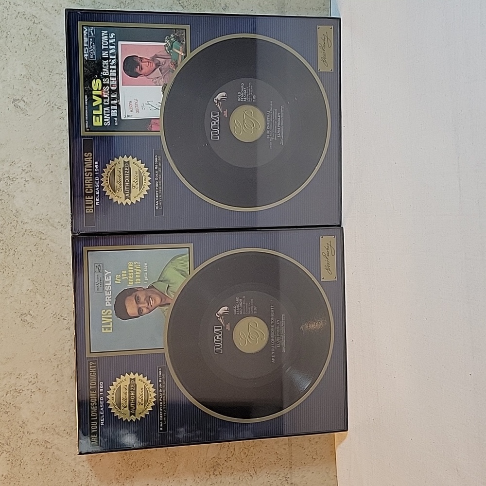 2 Elvis Presley Platinum Plaques